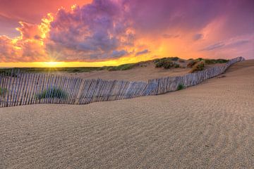 Beautiful colourful sunset after thunderstorm in dunes near Kijkduin and Scheveningen by Rob Kints