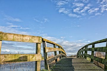 over the bridge is a blue sky van Willy Sybesma