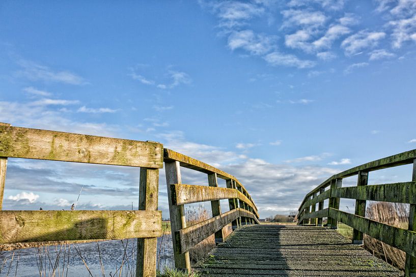 over the bridge is a blue sky by Willy Sybesma