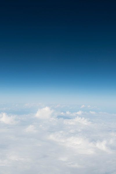 The horizon continuing into space. View from an airplane - travel photography by Christa Stroo photography