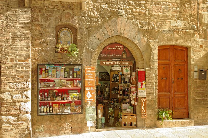 A picturesque street scene in Assisi by Berthold Werner