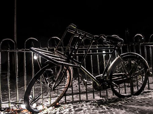 Bike covered in snow