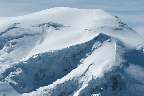 Small snow flow on the summit of Mont Blanc
