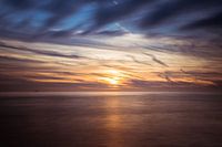 Zonsondergang boven de zee