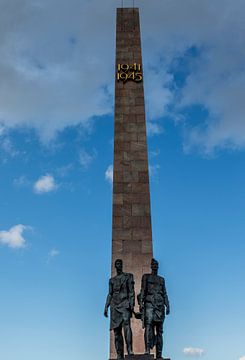 Geroicheskim Zashchitnikam Leningrada monument withStand statues of Russian young worker and young R by WorldWidePhotoWeb