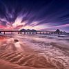 Heringsdorfer Seebrücke am Abend mit fantastischem Abendhimmel und Spiegelungen im Wasser von Stefan Dinse