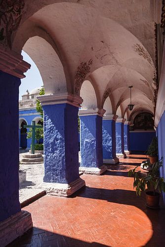 Blue and orange cloister at Santa Catalina monastery in Arequipa, Peru