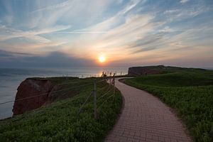 Zonsondergang over de rode kliffen van Helgoland van Sabine Wagner