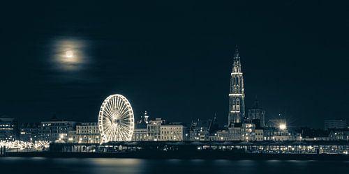 Skyline Antwerp in winter with a full moon