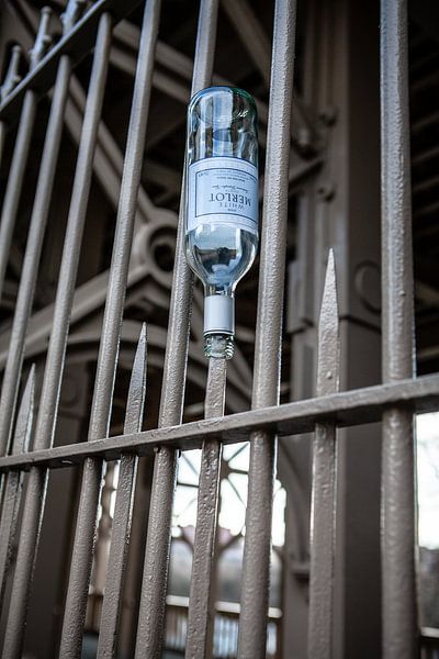 a wine bottle on High Level Bridge in NewCastle by Eric van Nieuwland