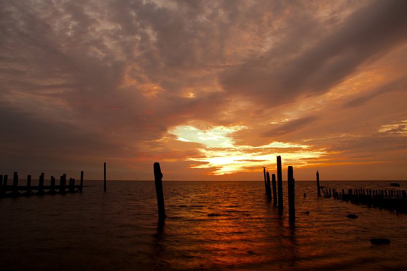 Sunrise over the harbour of De Cocksdorp, Texel by Wim van der Geest