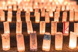 Handmade japanese buddhist washi paper lanterns illuminated at night. by Kuremo Kuremo