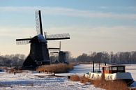Hollandse oude windmolens in wintertafreel  van Paul Franke thumbnail