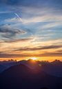 Coucher de soleil dans les Alpes par Emile Kaihatu Aperçu