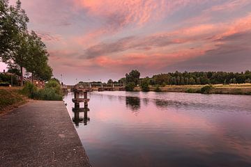 photo of an atmospheric sunrise at the locks of the river leie in Menen, West Flanders, Belgium