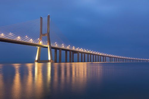 Vasco da Gama Bridge at blue hour and at high tide