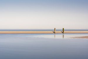Two breakwaters at low tide in Zeeland