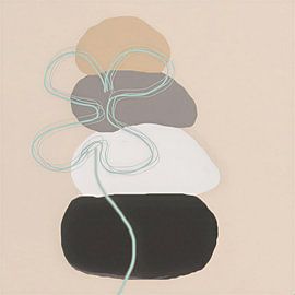Quelques galets empilés les uns sur les autres avec une fleur, dans le style wabi sabi japandi.