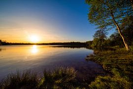 Beautiful sunset on a natural lake by Günter Albers