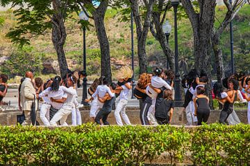 Young people dance in a park in Havana, Cuba