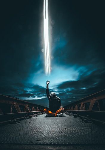 Man shoots beam of light by Martijn Van Weeghel