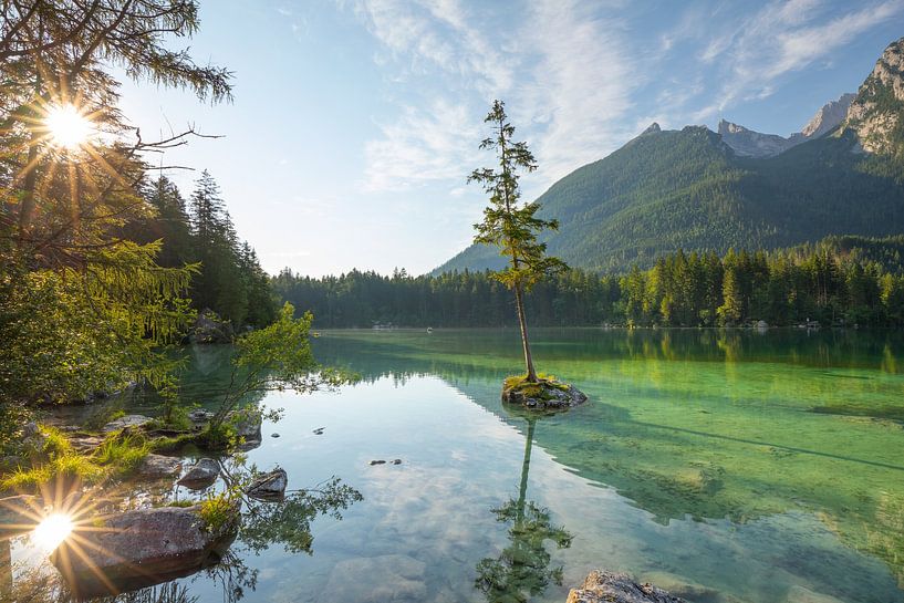 Hintersee near Ramsau with double sun star and crystal-clear water. by Jiri Viehmann
