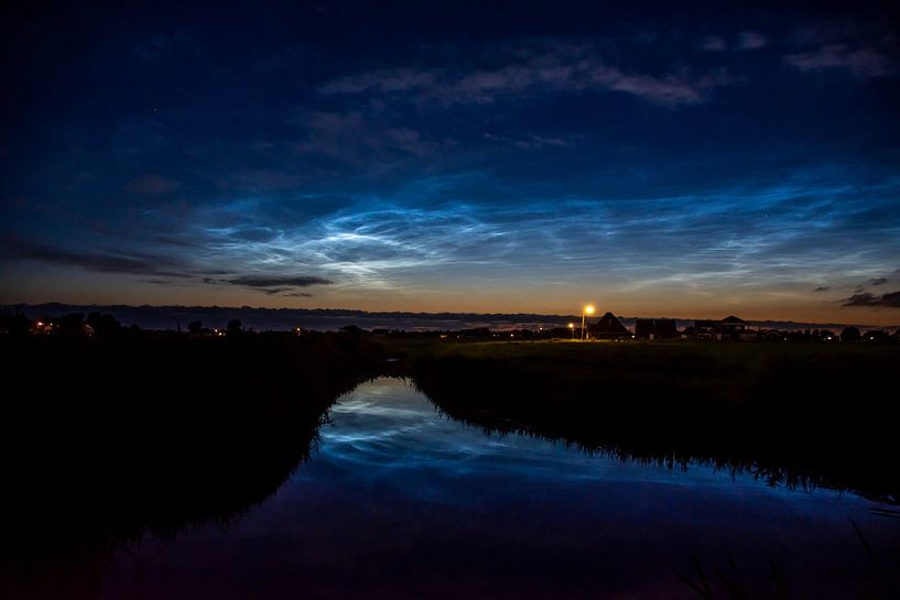 Luminous night clouds Schagen by Margreet Frowijn