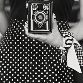 Woman in polkadot dress with vintage box camera by ArtStudioMonique