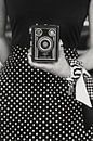 Woman in polkadot dress with vintage box camera van StyleStudio M21 thumbnail