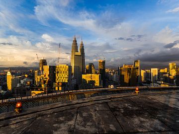 View of the Kuala Lumpur skyline from a helipad by Shanti Hesse