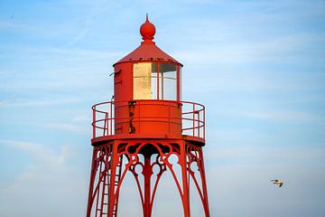 Red lighthouse on Vlissingen promenade, Zeeland by The Book of Wandering