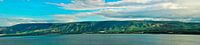 Golanhöhen und Tiberian-See-Panorama, wo grüne Hügel, blauer Himmel mit Wolken und die Oberfläche de