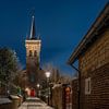 Elsloo in de avond in de winter met sneeuw van Maurice Meerten