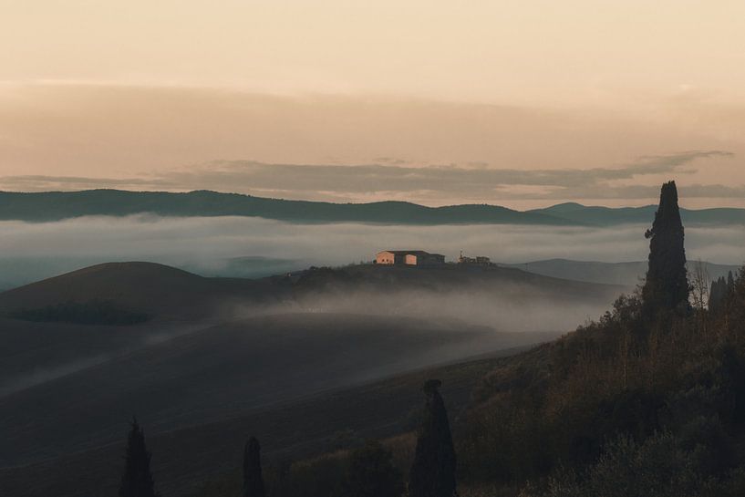 Lonely Tuscany farmhouse in the hilly Tuscan countryside in the morning mist by Besa Art