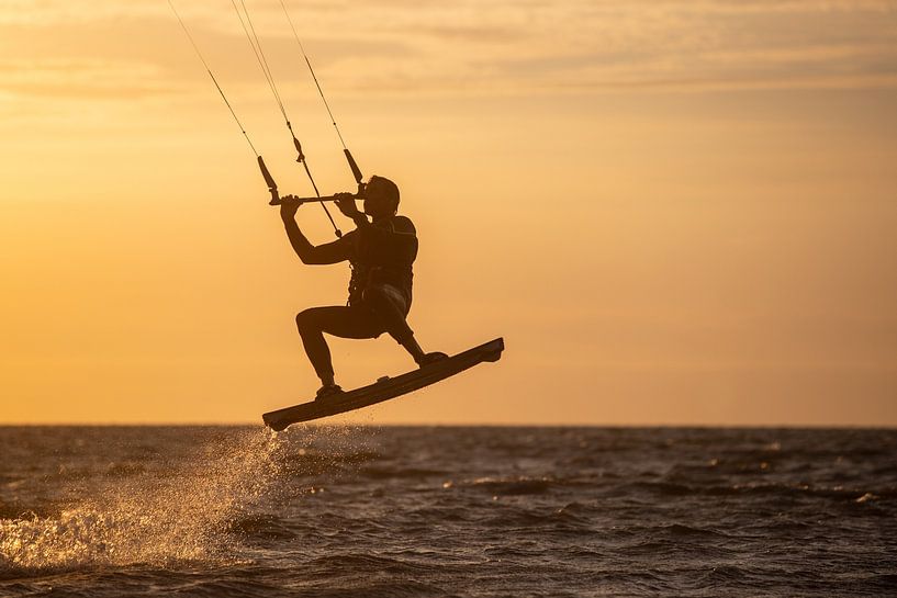 Kite surfing - playing on the waves by Ton Tolboom