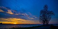 Setting sun at Lelystad near the Thinking Man