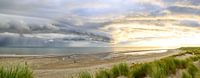 Zonsopkomst in de duinen van het eiland Texel met nadering van een stormwolk van Sjoerd van der Wal Fotografie thumbnail