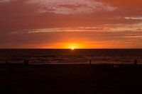 Zonsondergang na onweersbui Texel paal 17