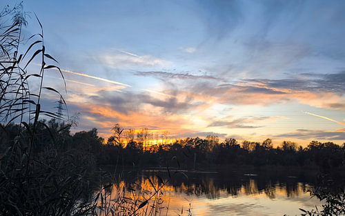 Golden Sunset Over Tranquil Waters