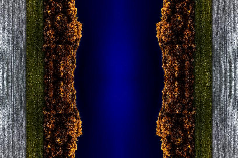 Abstract Aerialphoto of a river in the middle of a forest during autum by Jan Hermsen