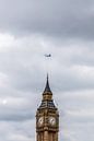 Airplane disappears in the clouds over Big Ben by Poster Art Shop thumbnail