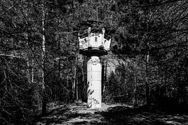 Old GDR watchtower in the forest by Frank Herrmann