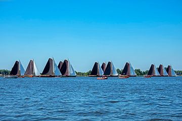 Traditional Frisian wooden sailing ships in a yearly competition van Eye on You