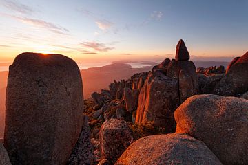 Red glowing sunrise over Mt Wellington near Hobart. View to Kingston.