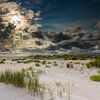 Plage Texel De Hors avec d'imposants nuages. sur Tjeerd Knier