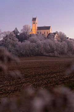 St Verena in Roggenbeuren on a winter evening by Jan Schuler