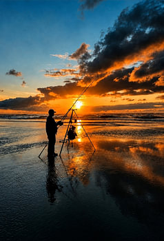 Le pêcheur au coucher du soleil à Vlieland