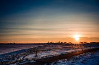Zonsopgang met sneeuwlandschap van Carina Calis thumbnail
