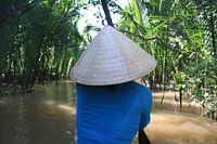 Rowing Vietnamese woman