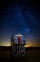 Little shipwreck shelter under the Milky Way at the isle of Terschelling by Maurice Haak thumbnail